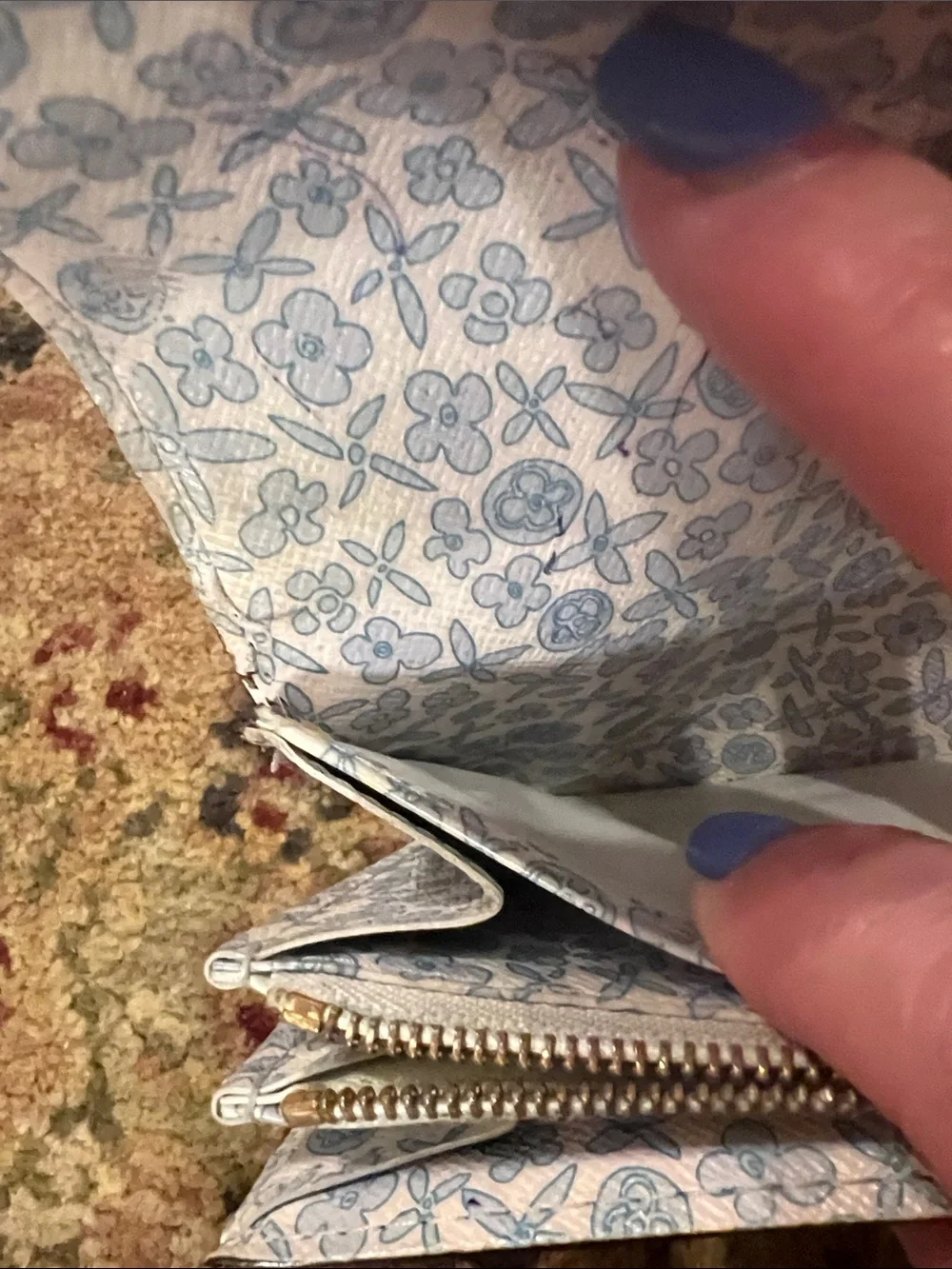 Louis Vuitton Monogram Sara wallet in Brown and Tan with blue floral interior